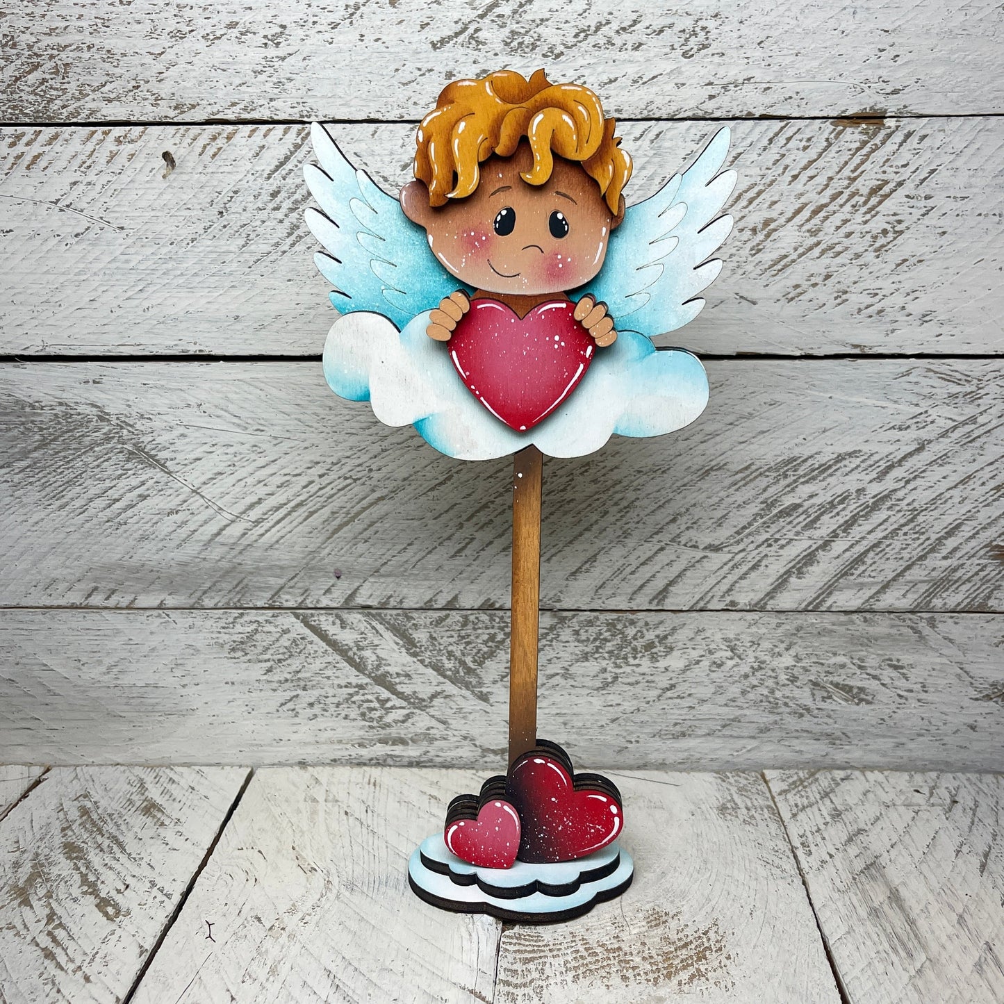 Cupido con piedistallo Out of the Wood