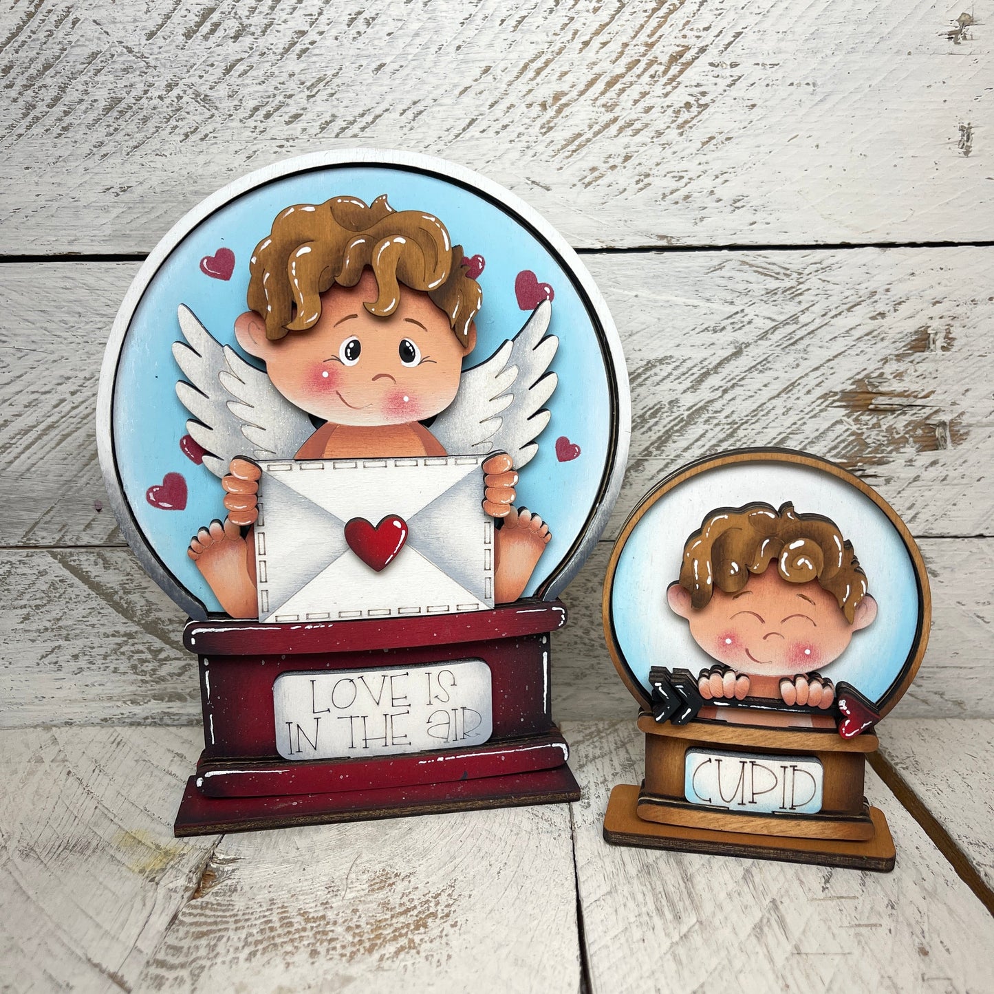 Sagoma cupido per Snow globe intercambiabile Out of the Wood