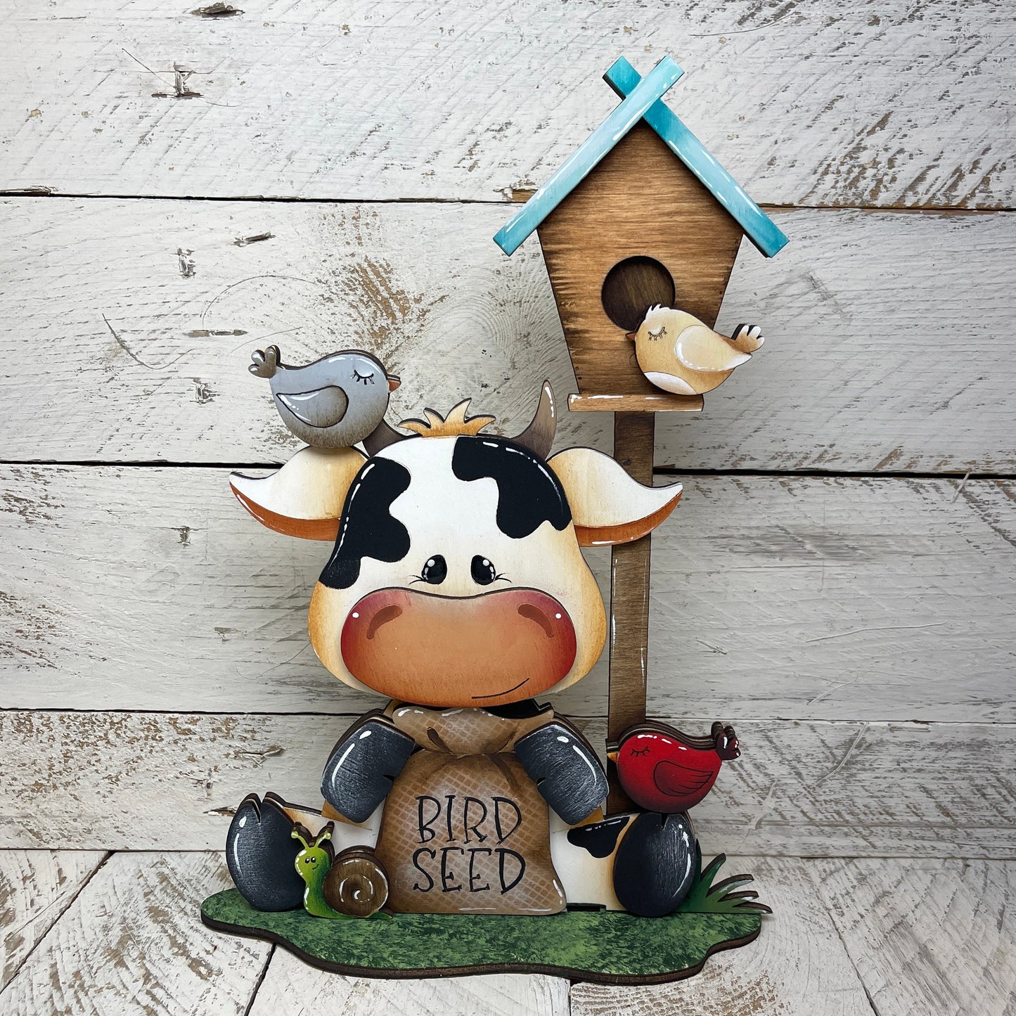 Maiali primaverili con piedistallo Out of the Wood