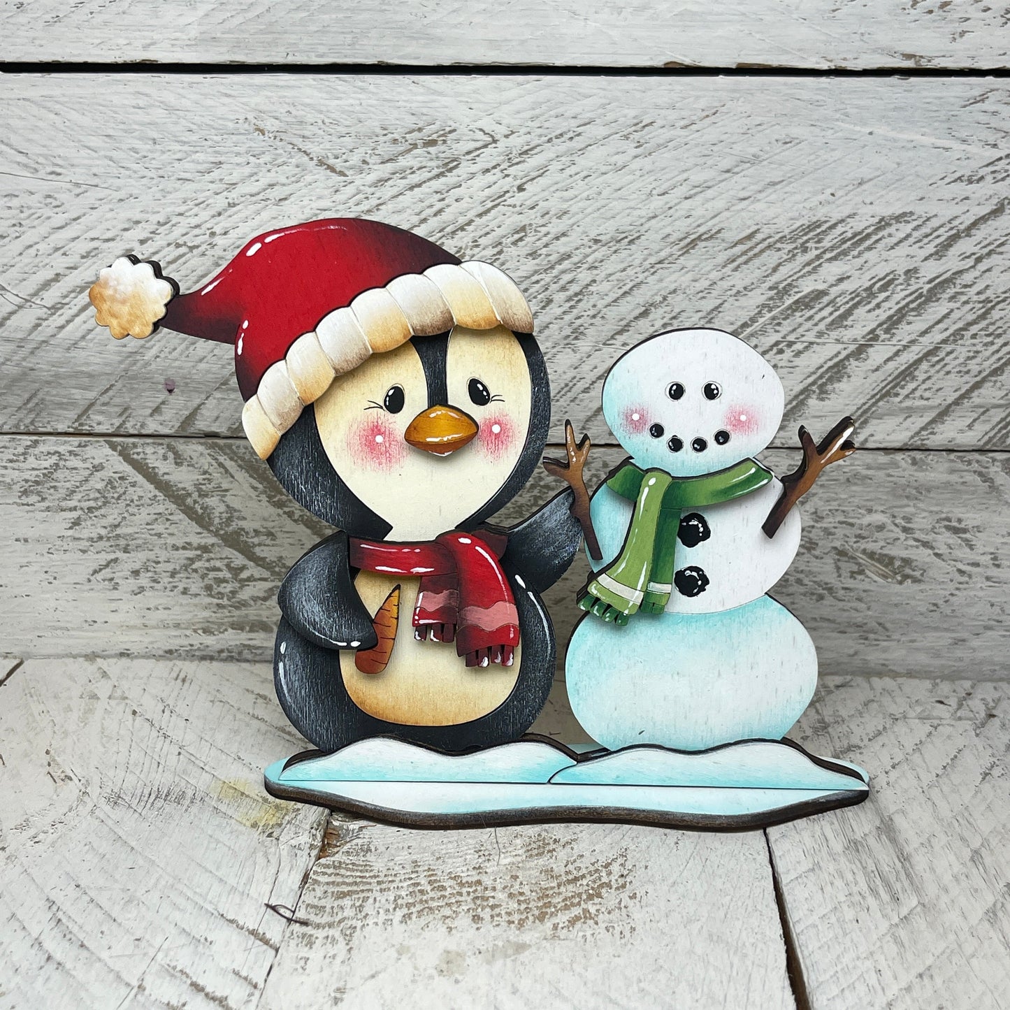Pinguini natalizzi con piedistallo Out of the Wood