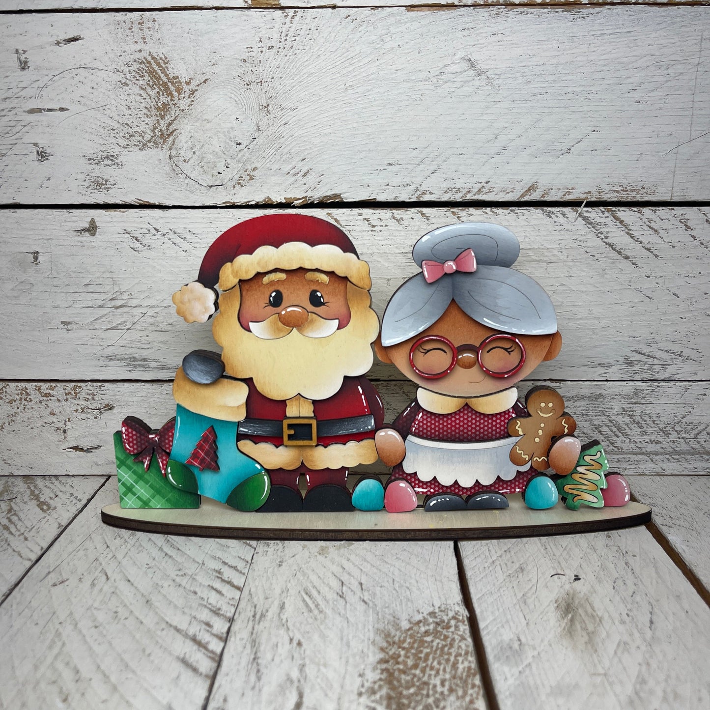 Coppia Santa e Mrs Claus con piedistallo Out of the Wood
