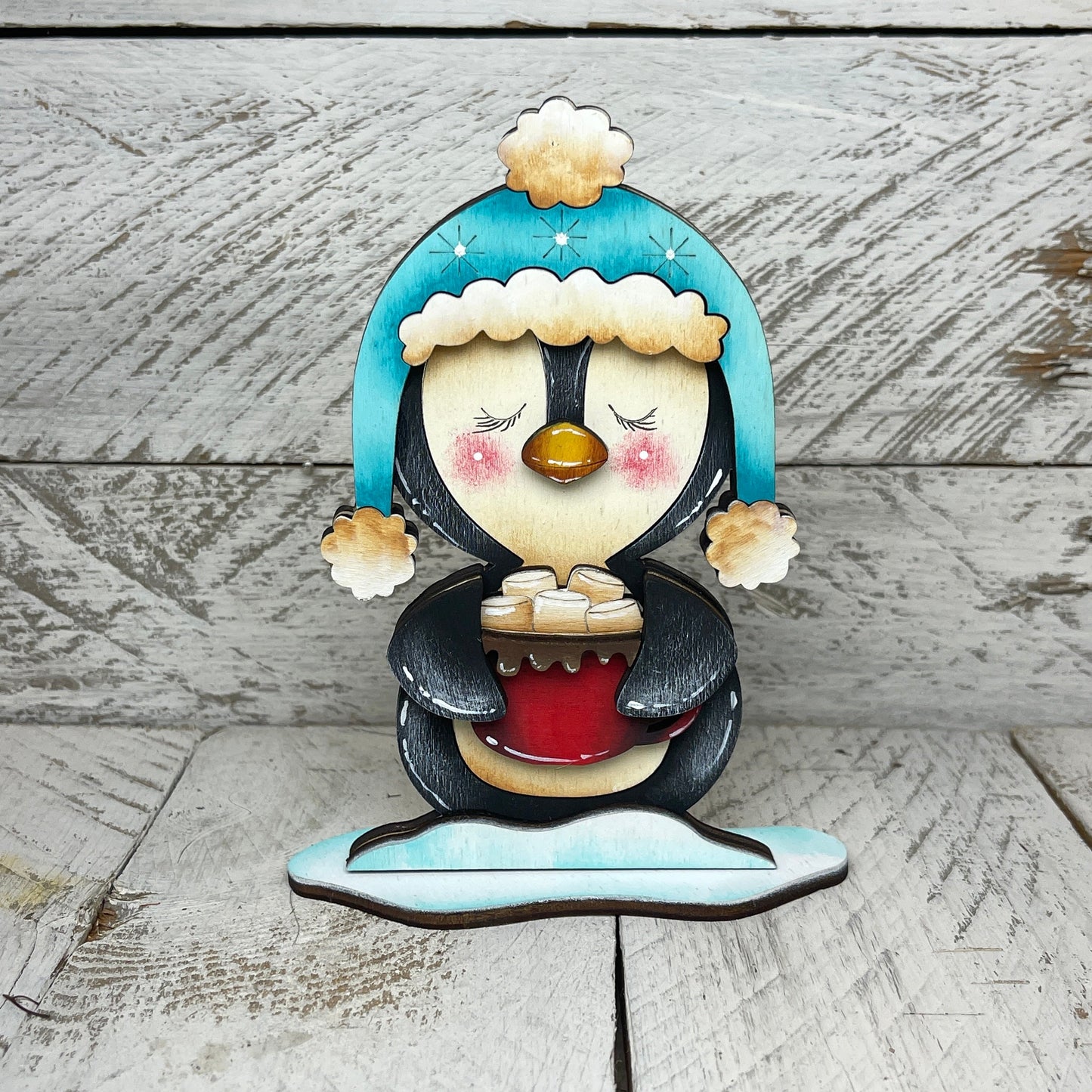 Pinguini natalizzi con piedistallo Out of the Wood