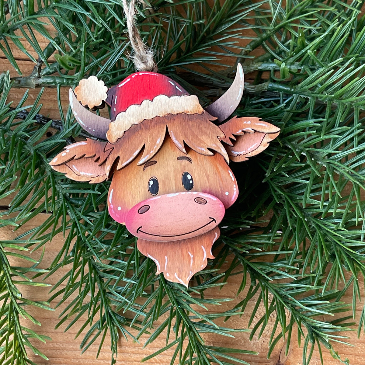 Mucca Highlander ornament Out of the Wood