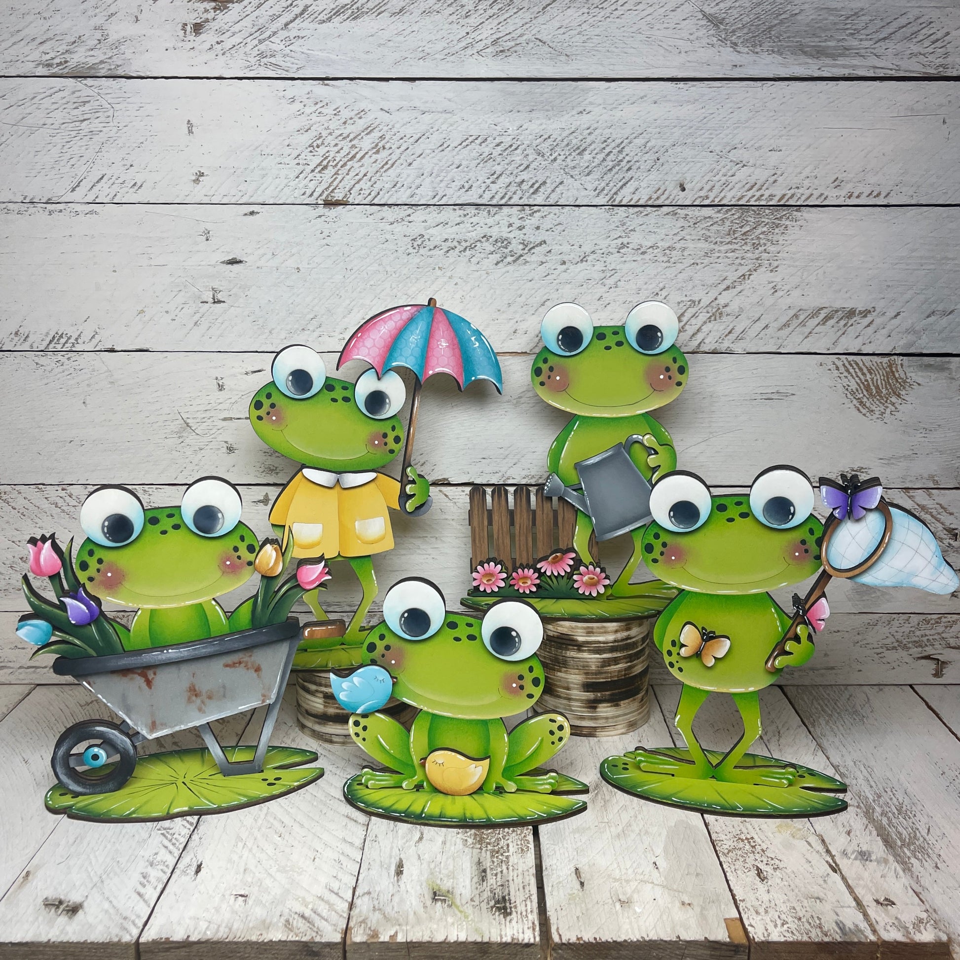 Rane primavera  con piedistallo Out of the Wood