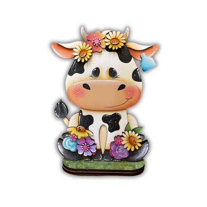 Mucca con fiori Out of the Wood