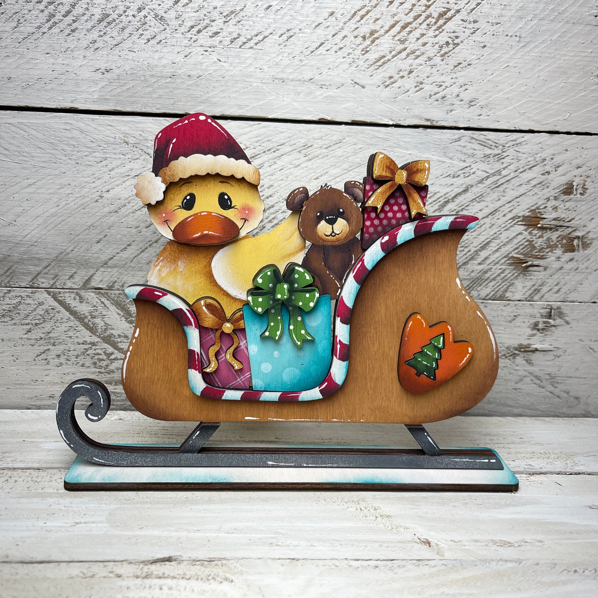 Christmas sleed with Duck Out of the Wood