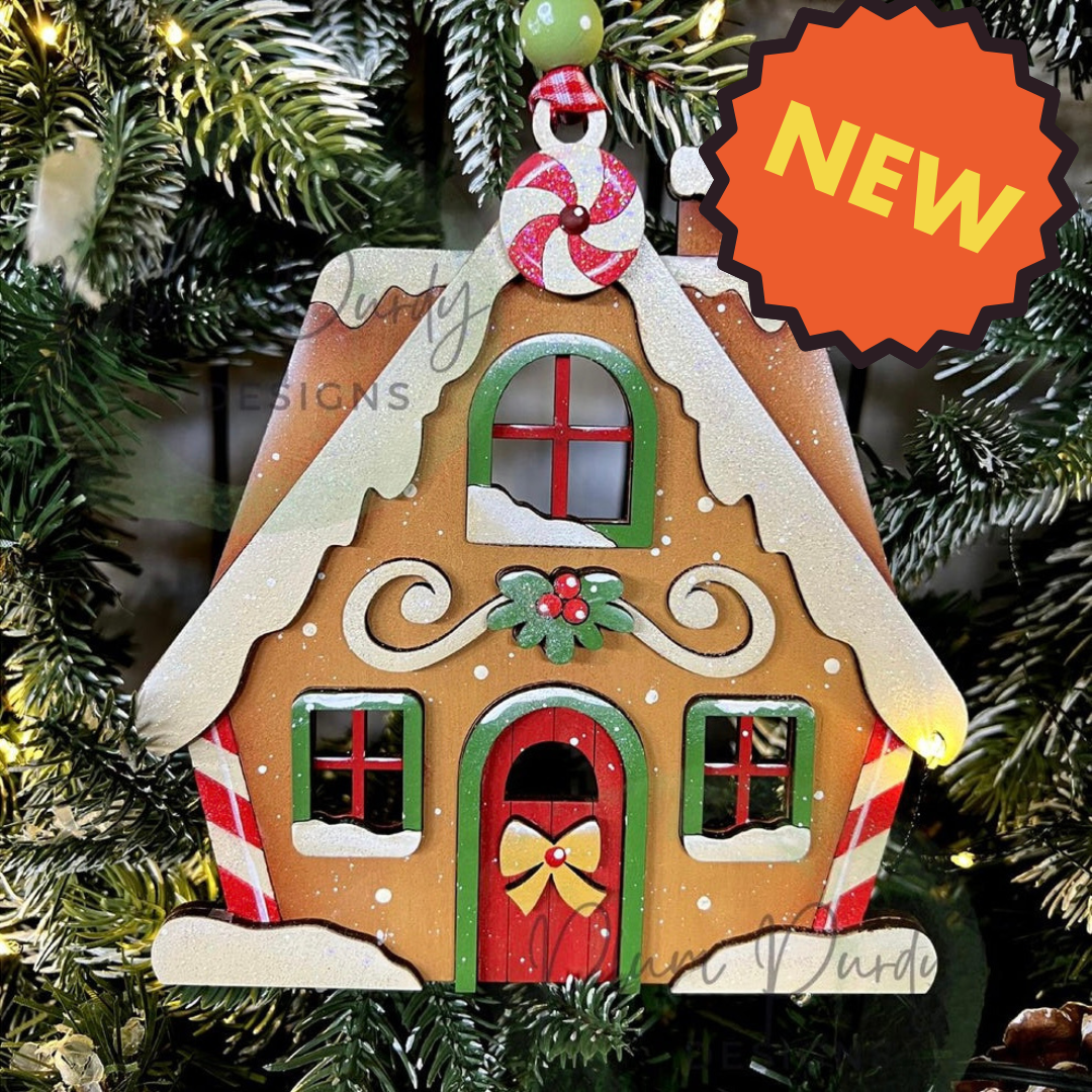 Gingerbread house candle ornament Out of the Wood