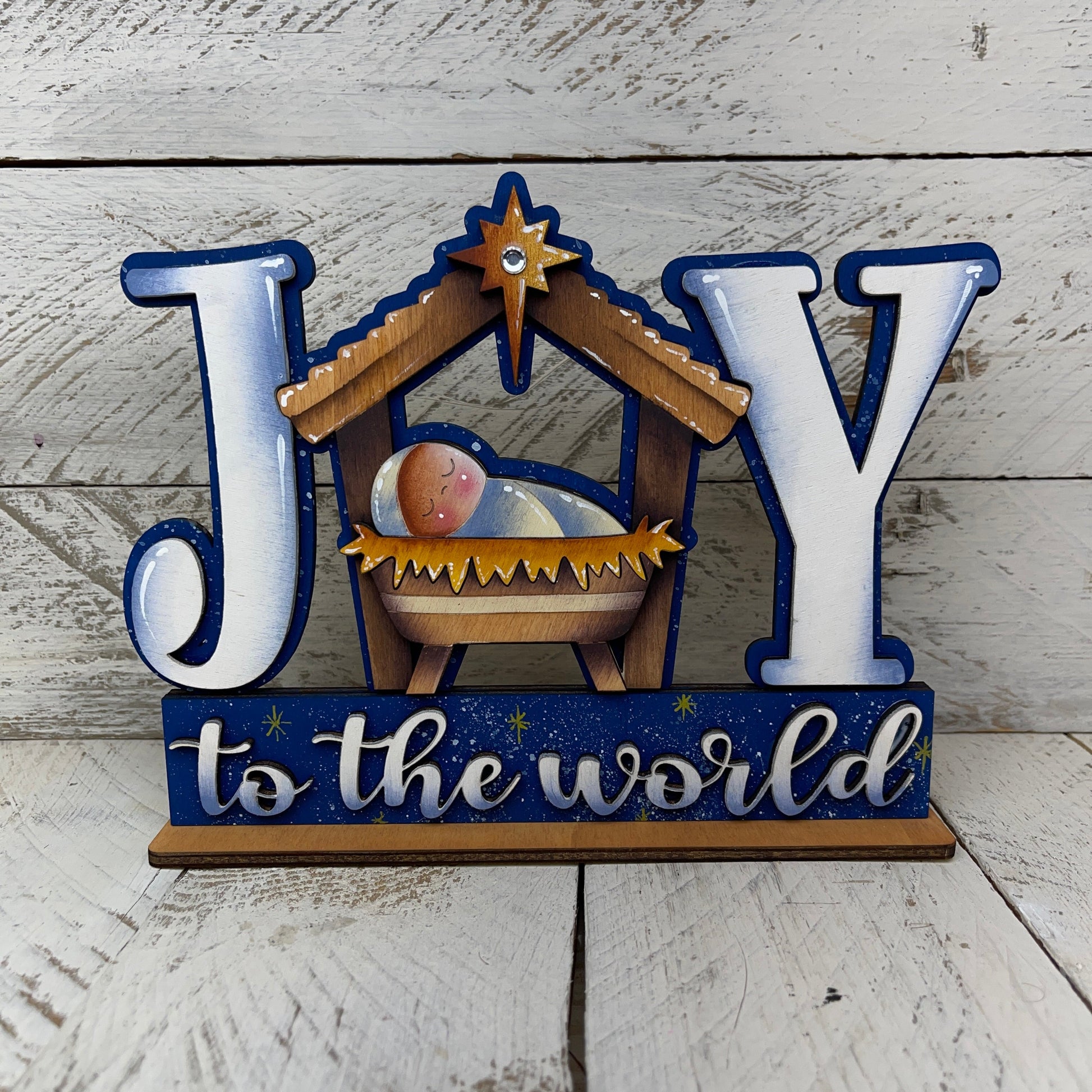 Scritta Joy culla Out of the Wood