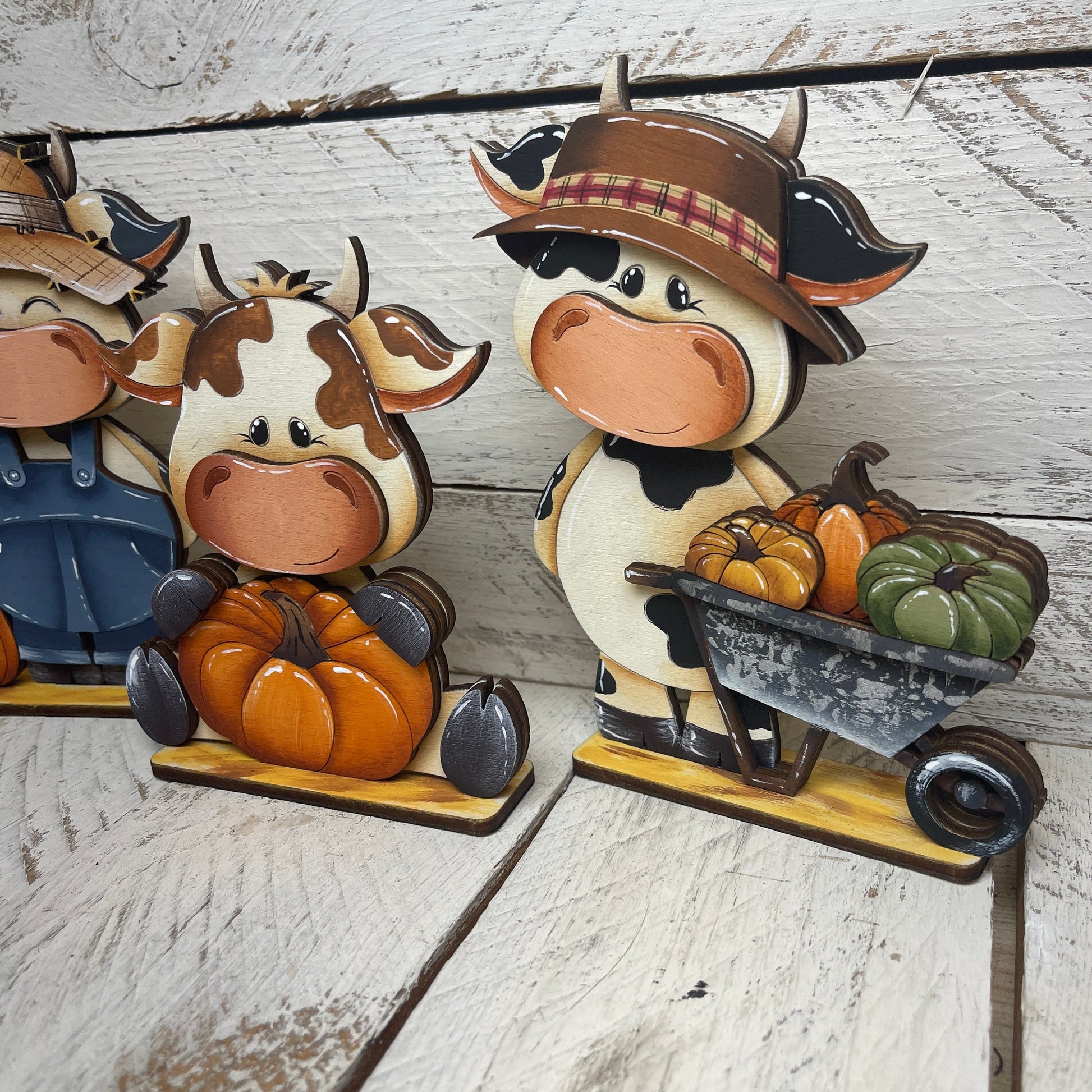 Mucche autunno con piedistallo Out of the Wood