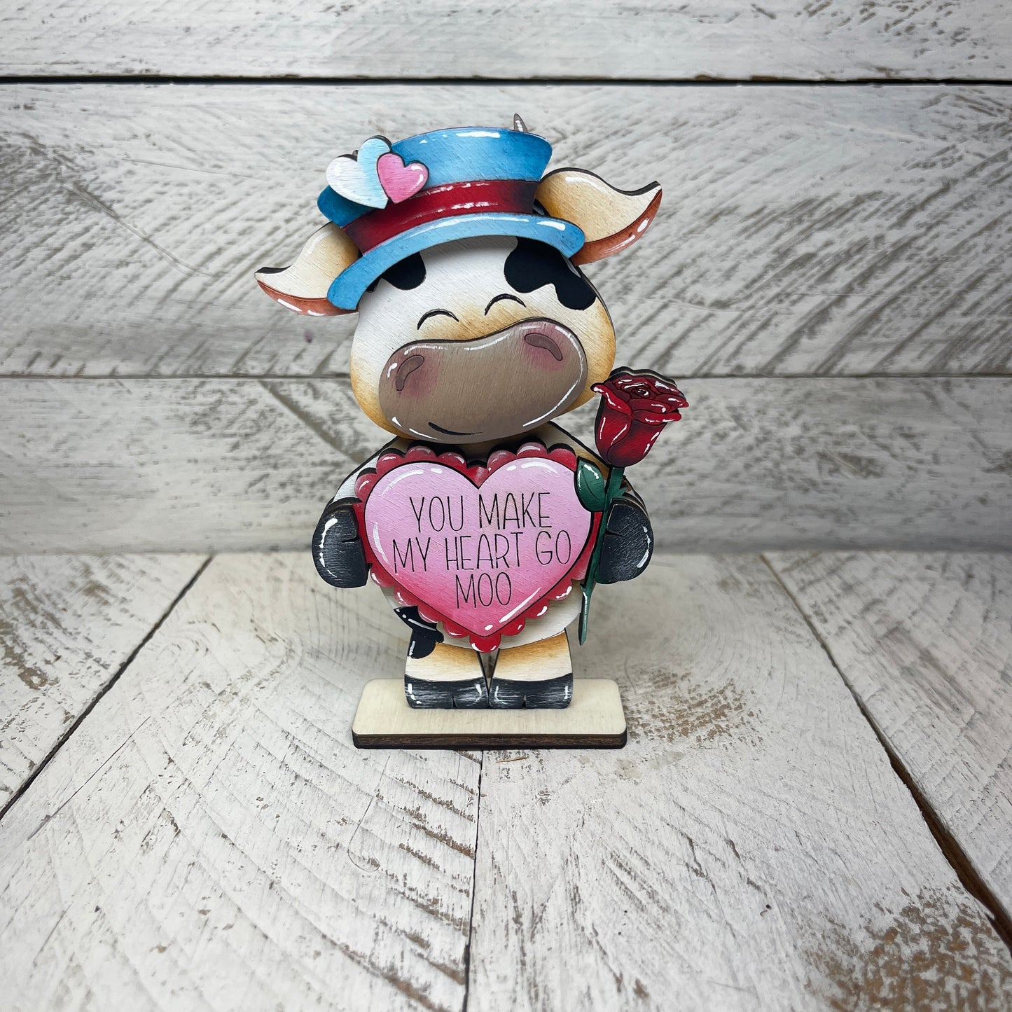 Mucche San Valentino con piedistallo Out of the Wood