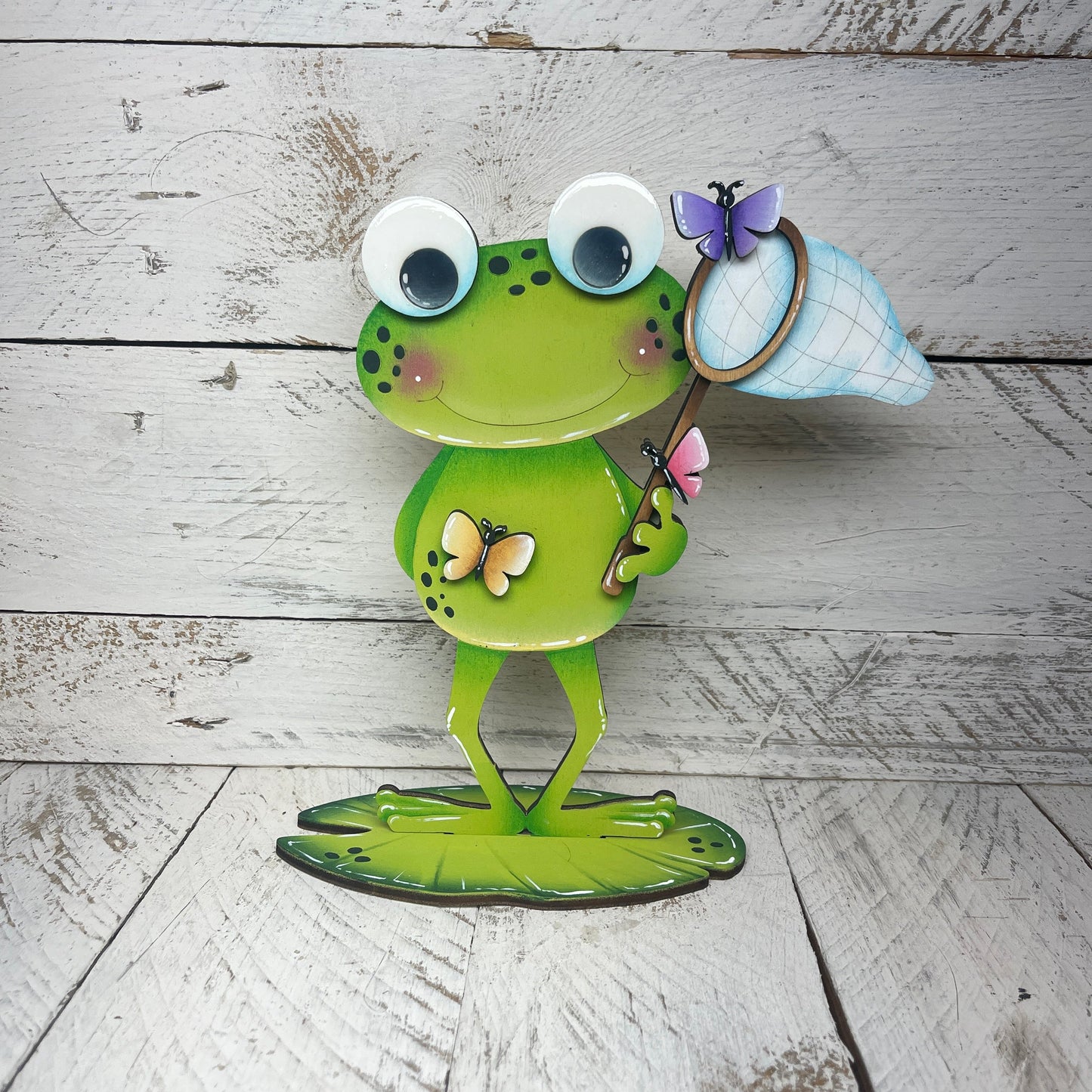 Rane primavera  con piedistallo Out of the Wood