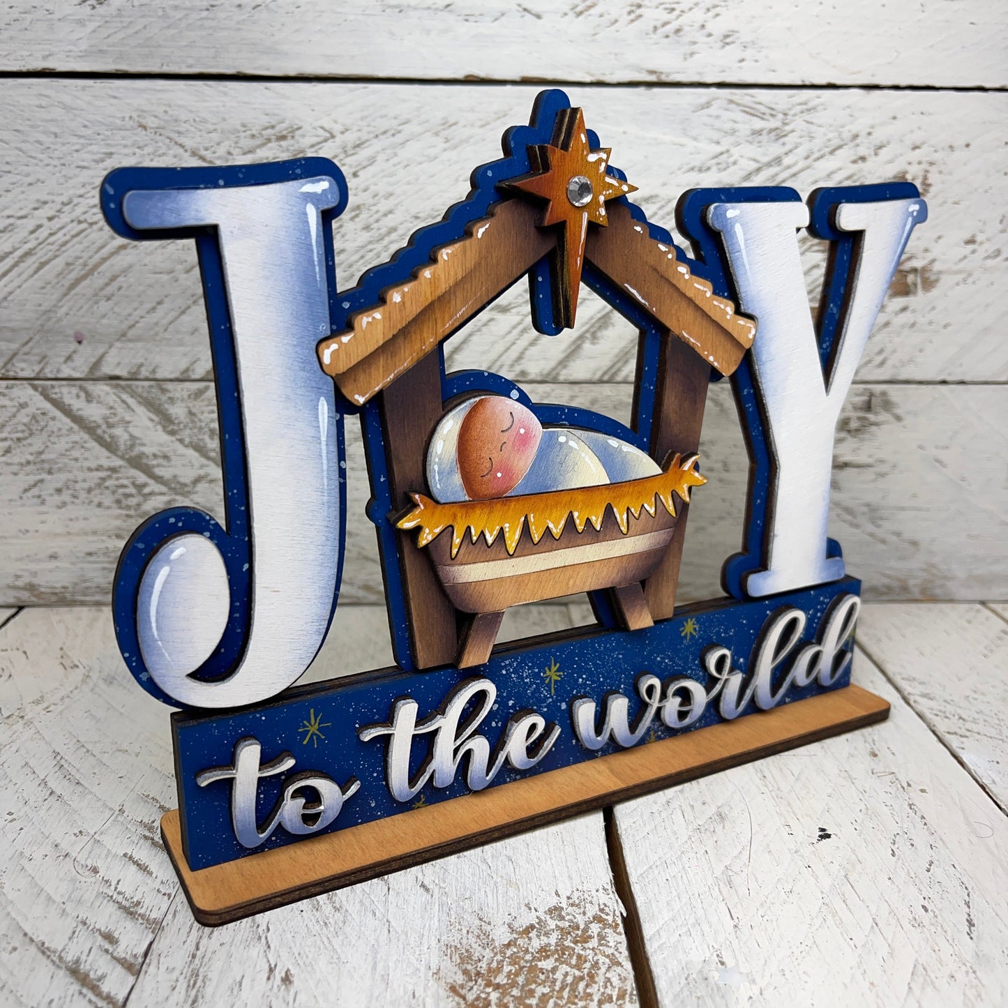 Scritta Joy culla Out of the Wood