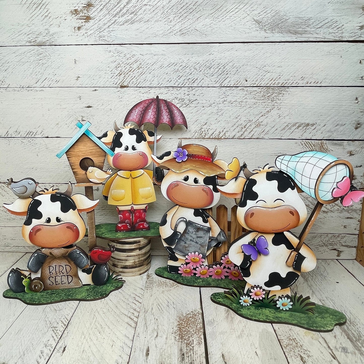 Mucche primaverili con piedistallo Out of the Wood