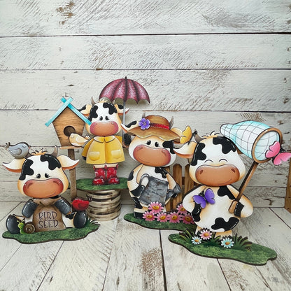 Mucche primaverili con piedistallo Out of the Wood