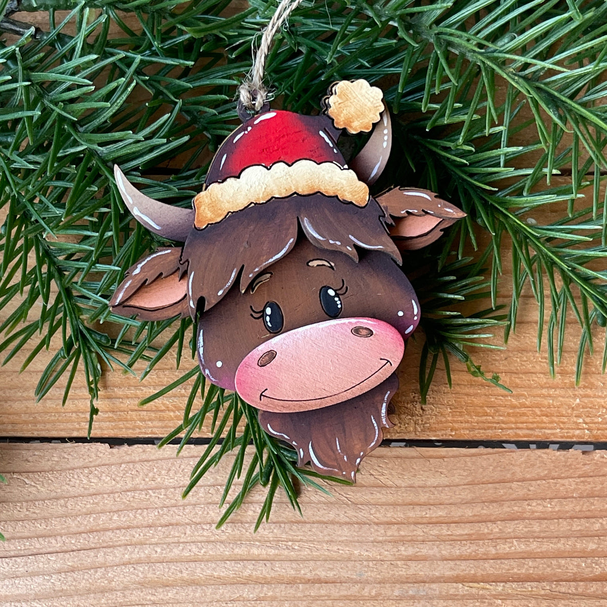 Mucca Highlander ornament Out of the Wood