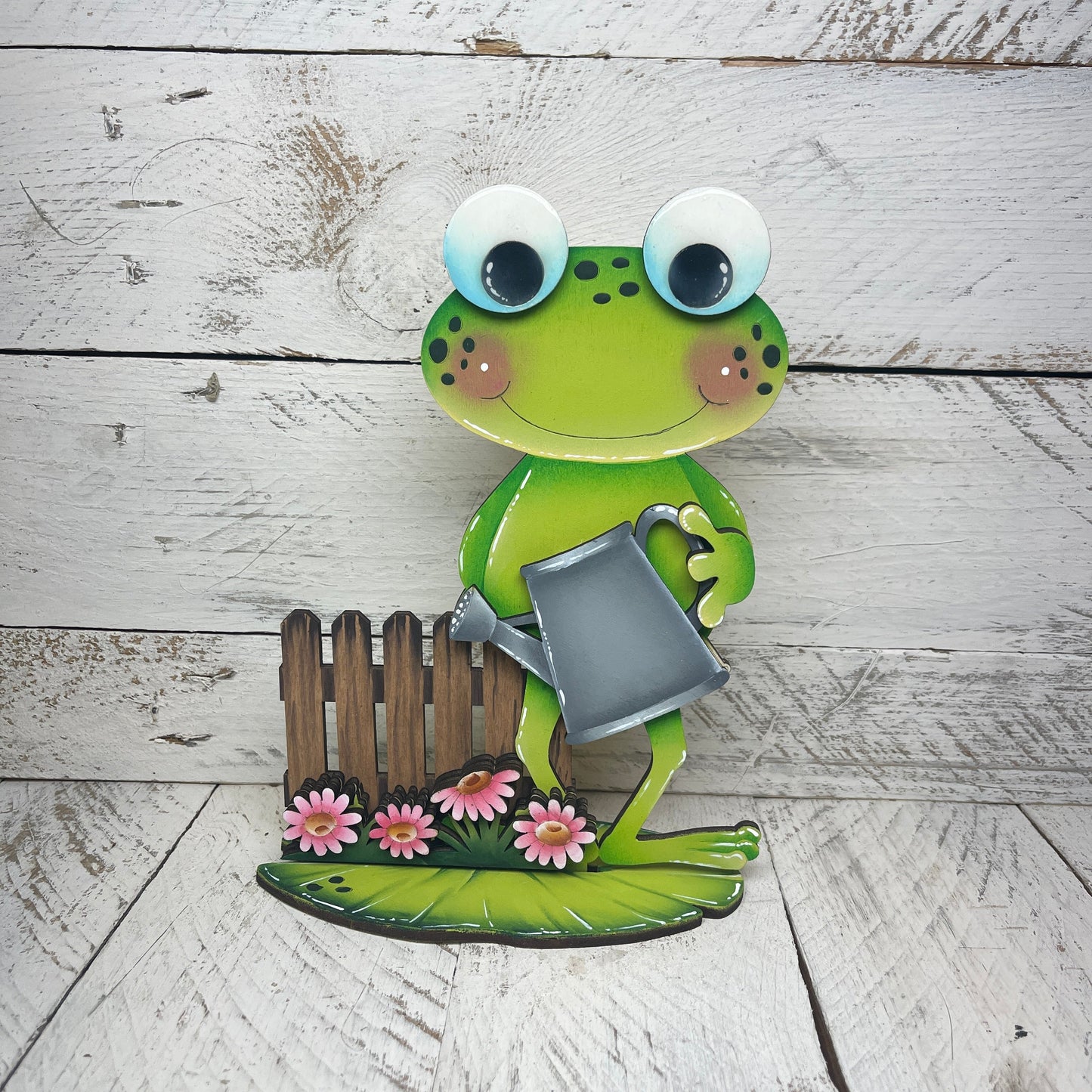 Rane primavera  con piedistallo Out of the Wood