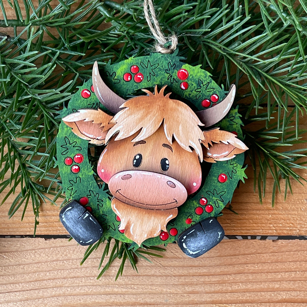 Mucca Highlander ornament Out of the Wood