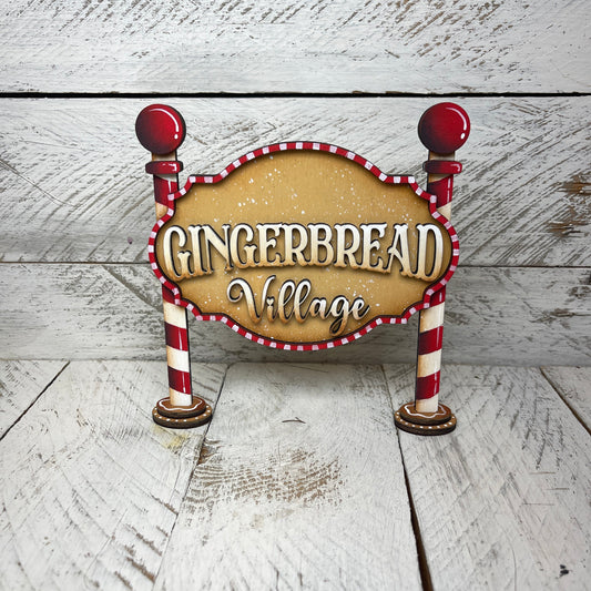 Insegna gingerbread village Out of the Wood