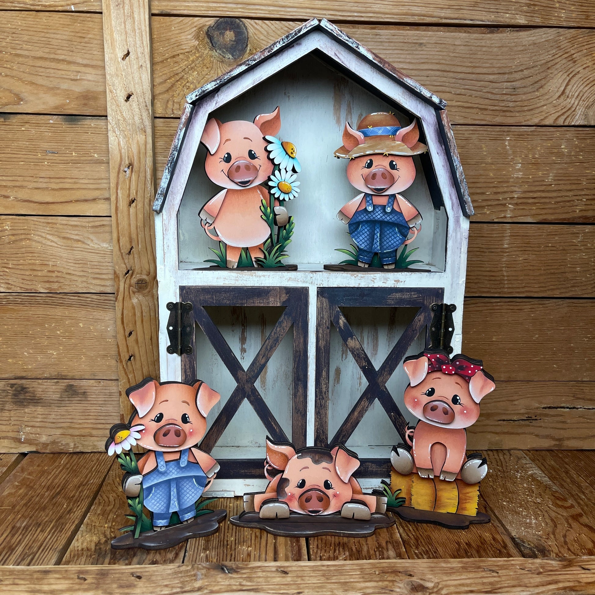 Maiali primaverili con piedistallo Out of the Wood