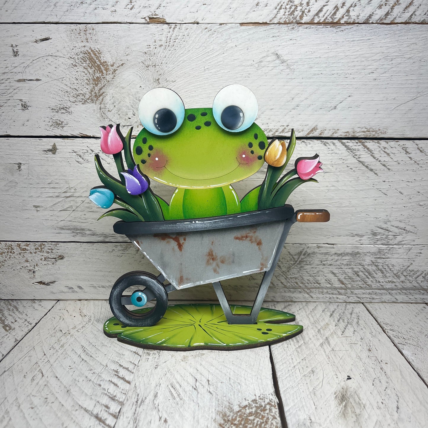 Rane primavera  con piedistallo Out of the Wood