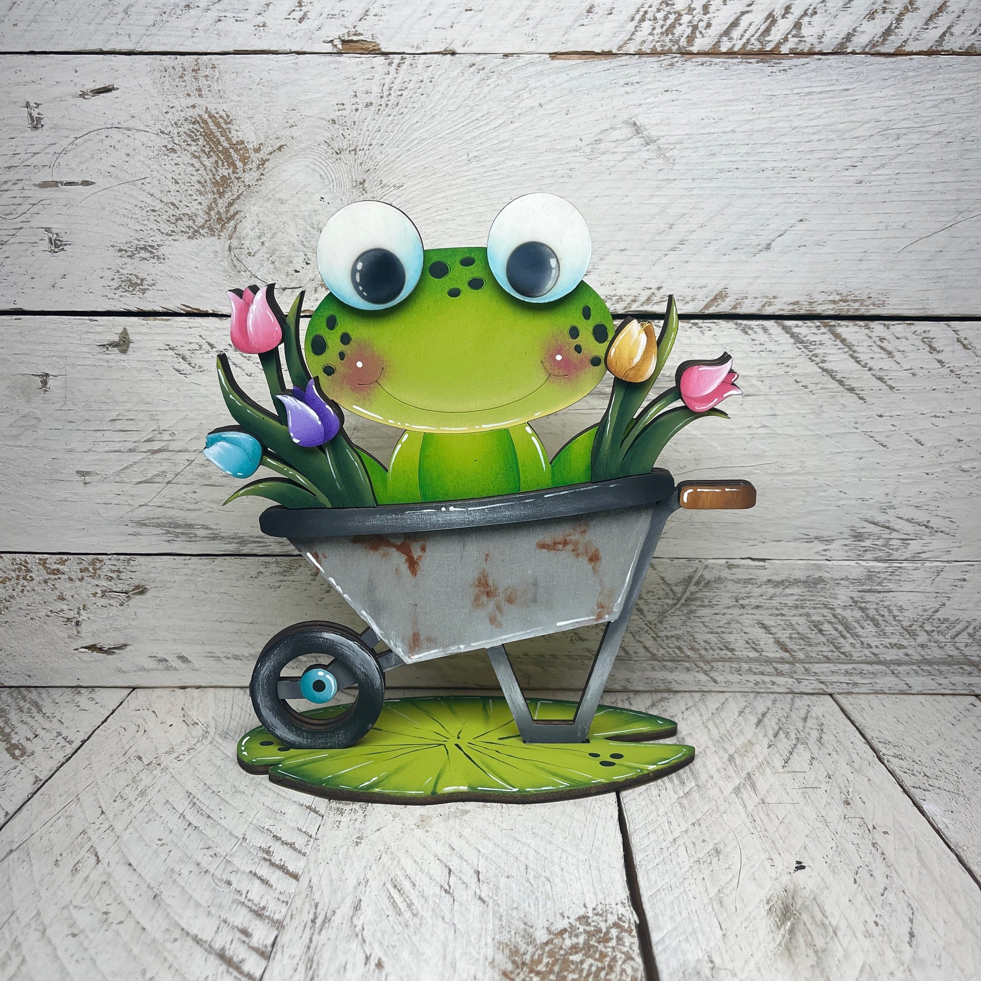 Rane primavera  con piedistallo Out of the Wood