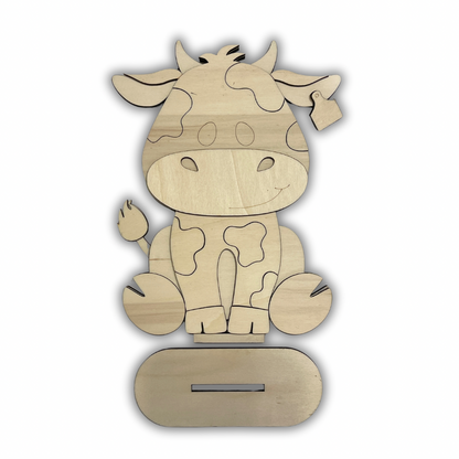 Mucca con fiori Out of the Wood