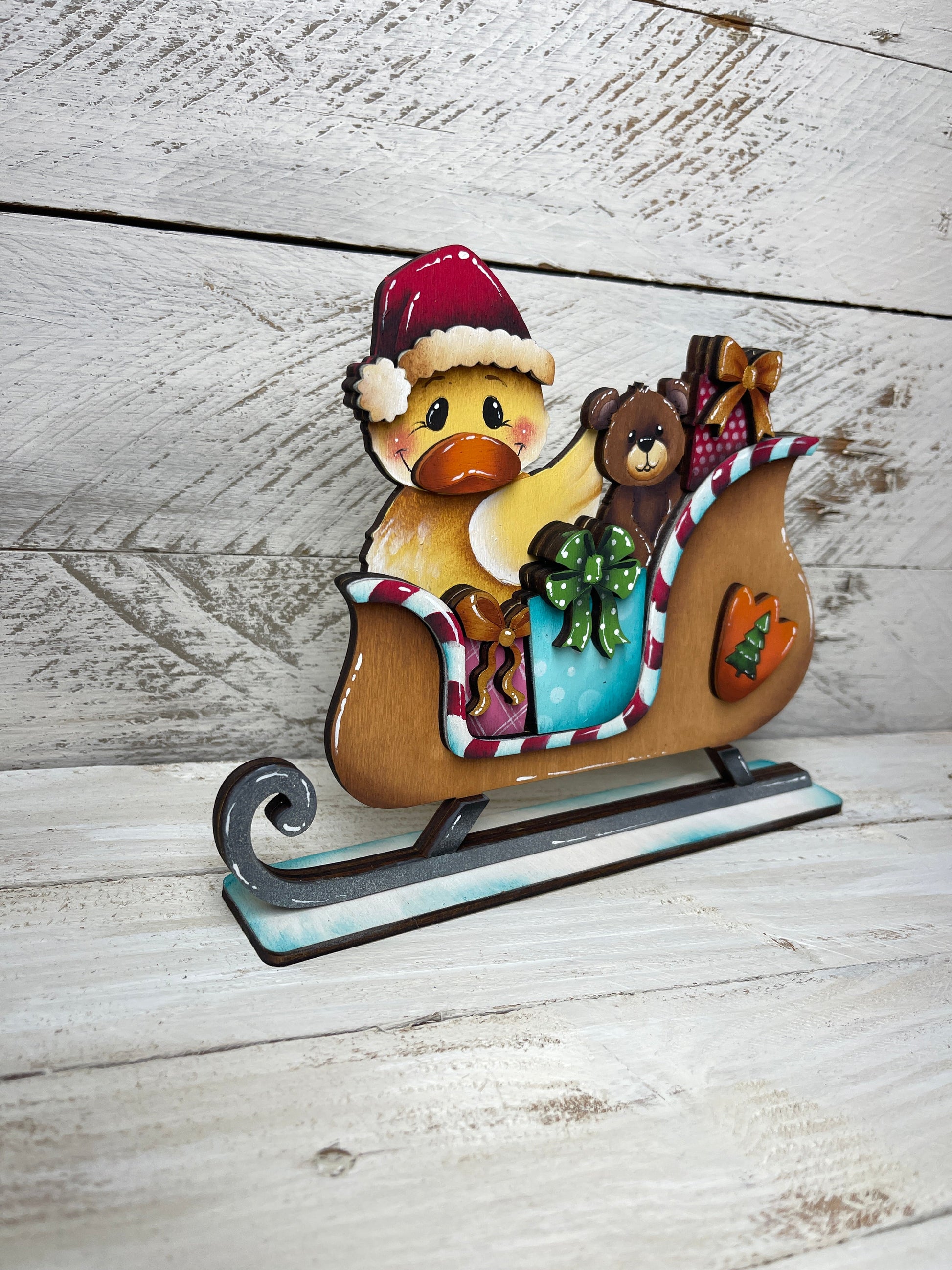 Christmas sleed with Duck Out of the Wood
