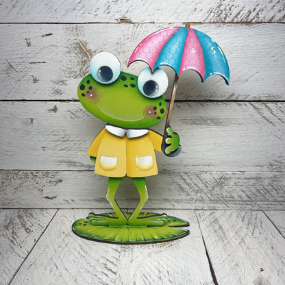 Rane primavera  con piedistallo Out of the Wood