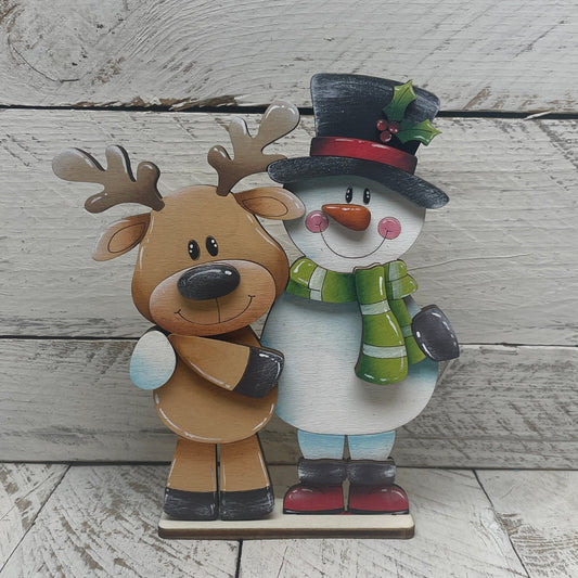 Rudolph e snowman Hugs Out of the Wood
