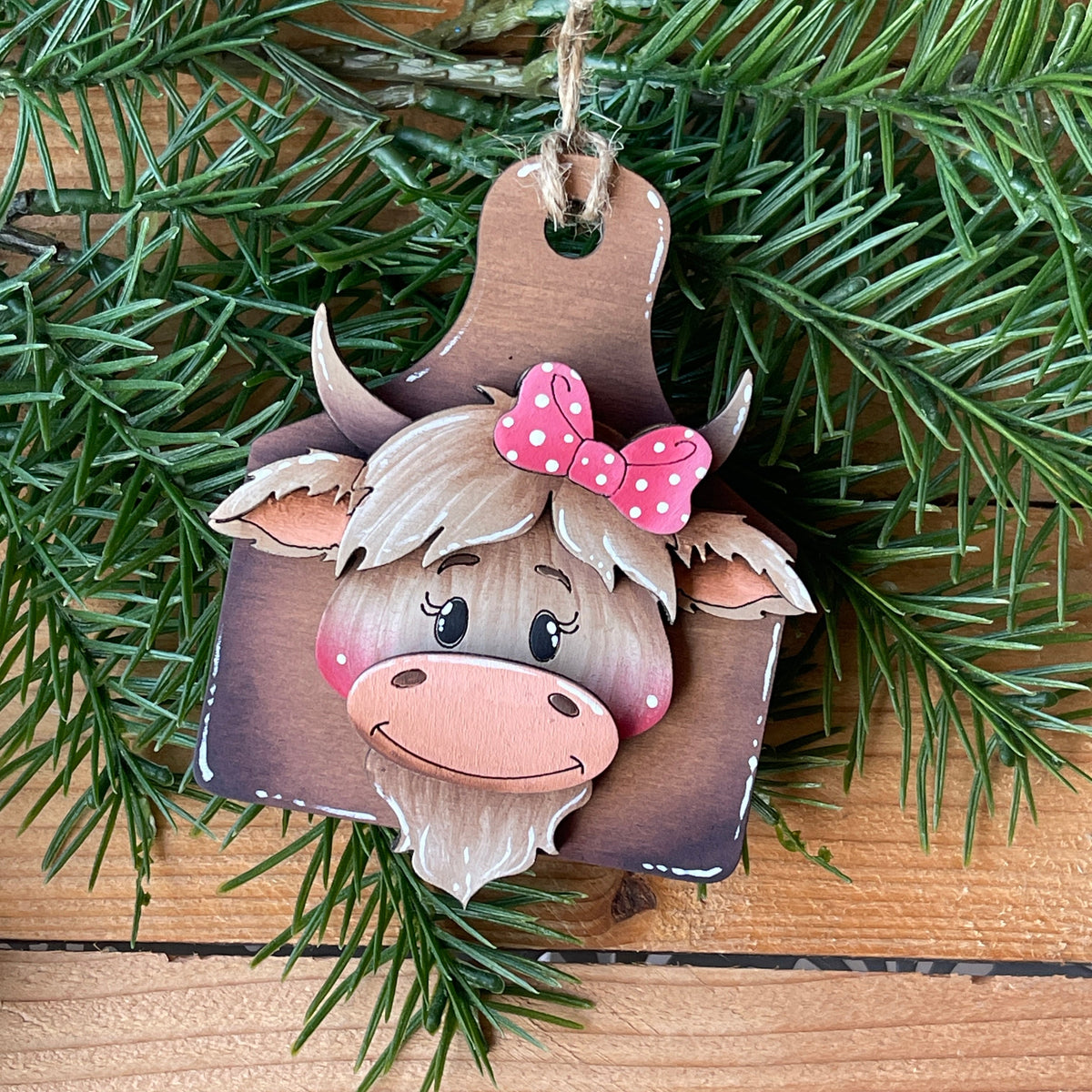 Mucca Highlander ornament Out of the Wood