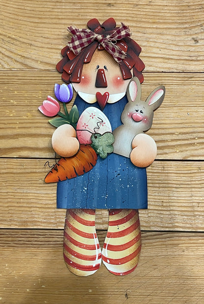 Raggedy  Ann Out of the Wood