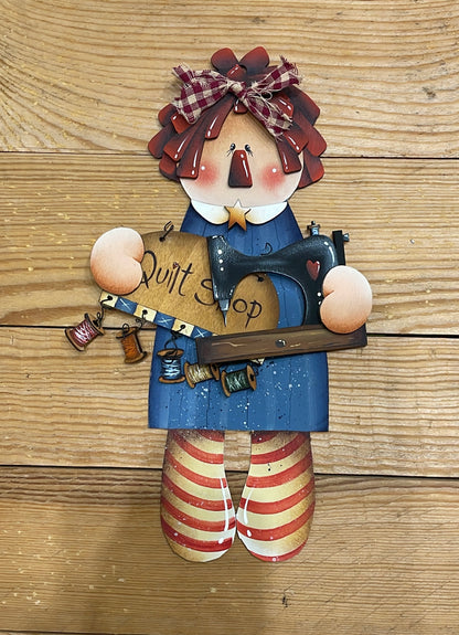 Raggedy  Ann Out of the Wood