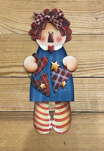 Raggedy  Ann Out of the Wood